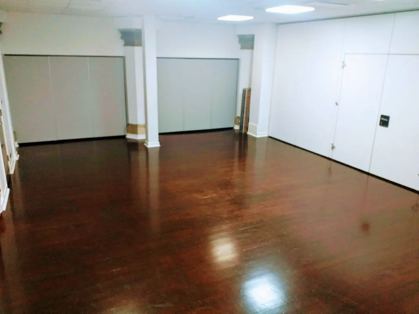 The spacious Brunswick Room with its hardwood floor